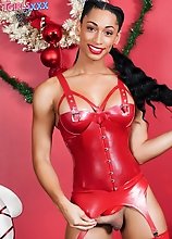 Looking beautiful with long pigtails, black tgirl Jasmine Lotus strips down to nothing and gives you a sticky Merry Christmas ending!