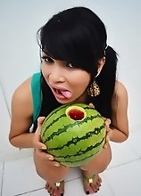 Petite Asian shemale with Big Tits fucking a watermelon